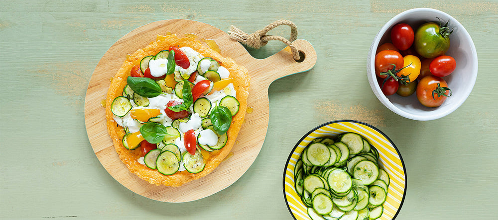 Pizza di lenticchie con burrata e pomodorini