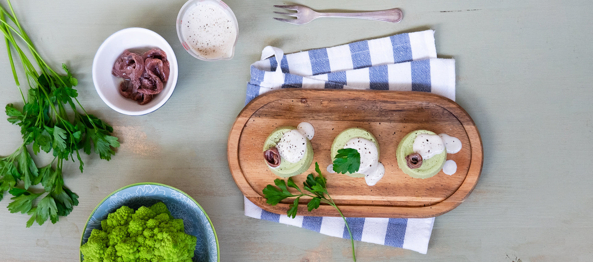 Flan di broccoli con crema di acciughe