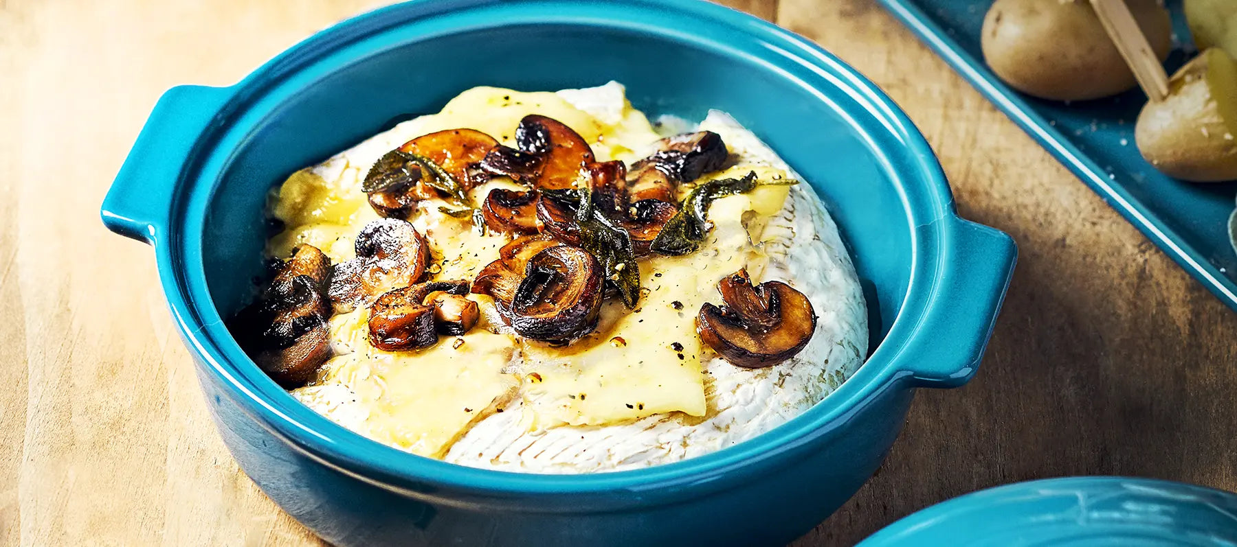 Camembert mit Champignons und Weißwein